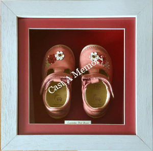 Baby's first pink shoes in wooden box frame