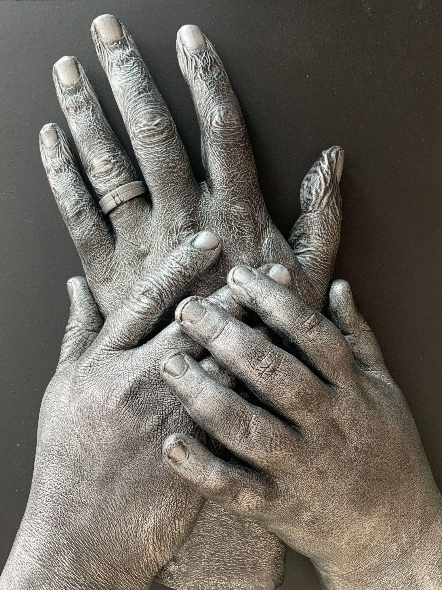 family hand clasp