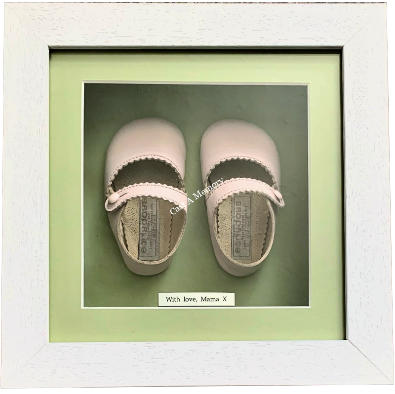 specialist framing of Pink first baby shoes in box frame