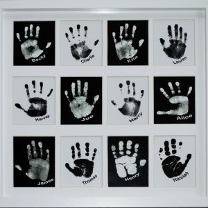 personalised pop art showing a group if children's hands and names