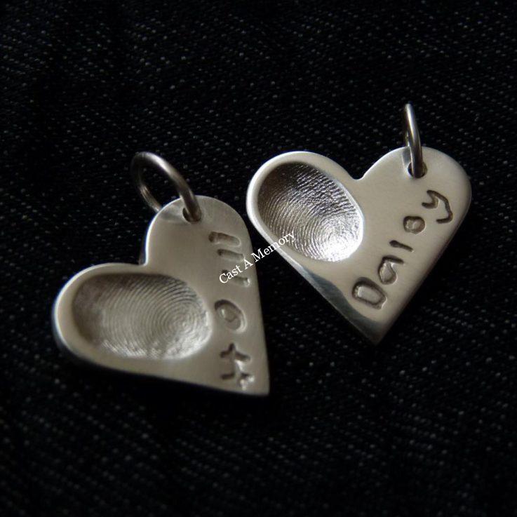 heart shaped medium silver charm with finger print impression