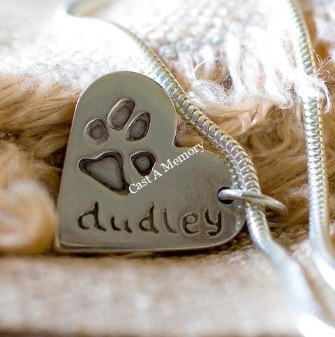 paw print silver charm